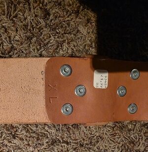 Wide Tan Leather Belt with Rivet Detail For Lifting Support.